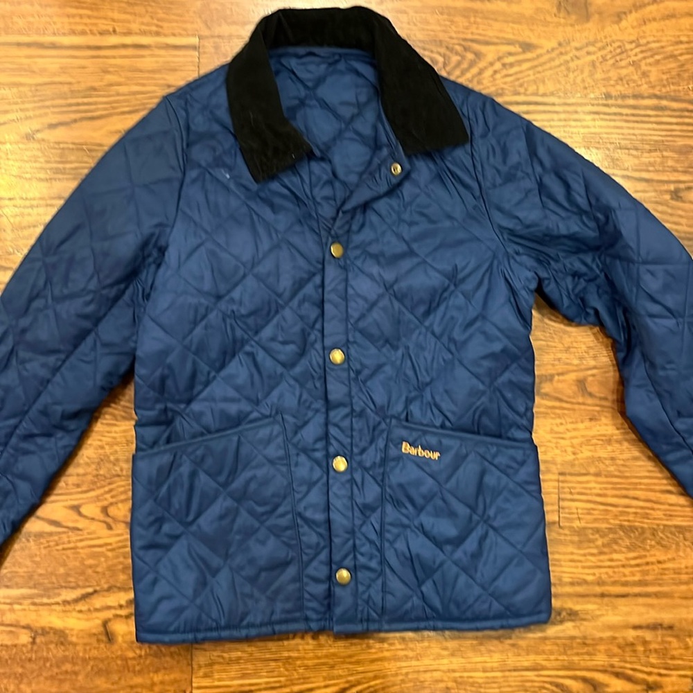 Navy quilted Barbour jacket in excellent condition. Size large (10/11).